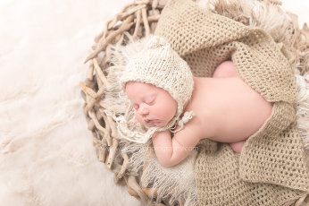 Fine art newborn baby photography by award winning Vancouver newborn photographer Wendy J.