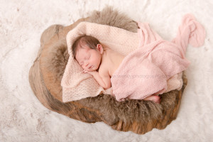 Sleeping newborn baby girl.